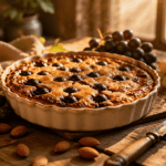 recette au raisin clafoutis doré et grappes fraîches