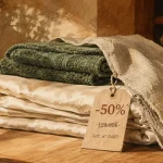 Déstockage linge de maison de luxe : linge en lin et satin -50% et étiquettes prix